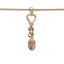 Load image into Gallery viewer, Celebrate Welsh tradition and heartfelt symbolism with this pre-owned 9ct yellow and rose gold Clogau lovespoon pendant necklace—rich in meaning and beautifully detailed for timeless elegance.

Design: The pendant features an intricate lovespoon design, symbolising love and commitment, crafted with yellow gold detailing and rose gold accents. Measuring 4.5cm in length including the bail, it offers a graceful and meaningful presence.

