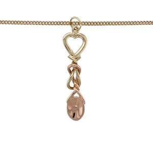Celebrate Welsh tradition and heartfelt symbolism with this pre-owned 9ct yellow and rose gold Clogau lovespoon pendant necklace—rich in meaning and beautifully detailed for timeless elegance.

Design: The pendant features an intricate lovespoon design, symbolising love and commitment, crafted with yellow gold detailing and rose gold accents. Measuring 4.5cm in length including the bail, it offers a graceful and meaningful presence.
