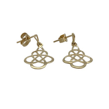 Load image into Gallery viewer, Add symbolic elegance and heritage style to your jewellery collection with these pre-owned 9ct yellow gold Celtic knot drop earrings—lightweight, graceful, and rich in meaning.

Design: Each earring features a classic Celtic knot motif, symbolising eternity and interconnectedness, with a flowing drop design that adds subtle movement.
Material: Made from 9-carat yellow gold, the polished finish enhances the intricate pattern and gives the earrings a warm, radiant glow.

