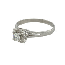 Load image into Gallery viewer, Add classic brilliance and modern refinement to your collection with this pre-owned 18ct white gold diamond set solitaire ring—elegant, timeless, and beautifully understated.

Design: The ring features a brilliant cut diamond of approximately 0.25ct in a contemporary square setting, offering a clean and elegant presentation with subtle sparkle.
Material: Made from 18-carat white gold, the polished finish complements the bright stone and gives the ring a sleek, modern look.

