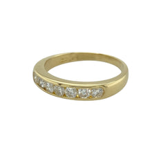 Load image into Gallery viewer, Add timeless sparkle and refined elegance to your collection with this pre-owned 18ct yellow gold diamond set band ring—classic, versatile, and perfect for everyday luxury or special occasions.

Design: The ring features a 4mm wide front adorned with a row of sparkling diamonds, with approximately 0.42ct of total diamond content for a bright, elegant finish.
Material: Made from 18-carat yellow gold, the polished surface enhances the brilliance of the diamonds and gives the band a warm, luxurious glow.

