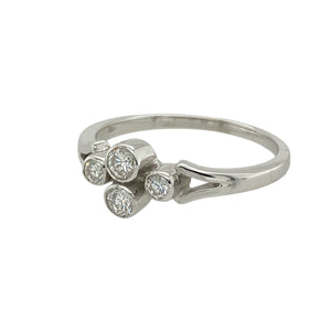 Add sleek sophistication and timeless sparkle to your collection with this pre-owned 18ct white gold diamond rubover set ring—elegant, modern, and full of refined detail.

Design: The ring features four brilliant cut diamonds set closely together in a clean rubover setting, framed by split shoulders that enhance the design’s flow and structure. The total diamond content is approximately 0.30ct.
