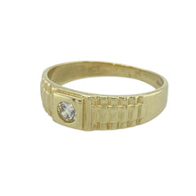 Load image into Gallery viewer, Bring bold design and subtle sparkle to your collection with this pre-owned 9ct yellow gold watch strap ring, featuring a sleek cubic zirconia accent and distinctive styling—perfect for everyday edge or standout layering.

Design: Inspired by the look of a classic watch strap, the ring features intricate detailing along the band and a central cubic zirconia stone measuring 4mm in diameter. The design offers a unique blend of texture and shine.

