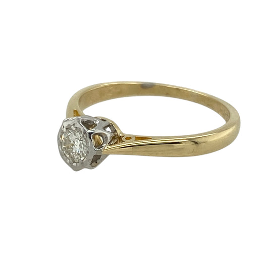 Bring timeless elegance and refined sparkle to your collection with this pre-owned 18ct yellow gold and platinum solitaire ring, featuring a brilliant-cut diamond in a classic setting—perfect for meaningful occasions or everyday luxury.

Design: The ring showcases a single brilliant-cut diamond of approximately 0.14ct, held in a platinum setting that enhances its clarity and brilliance. The solitaire design offers a clean, timeless look that never goes out of style.
