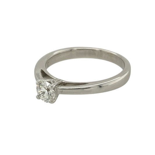 Bring timeless sophistication and radiant sparkle to your collection with this pre-owned 18ct white gold solitaire ring, featuring a brilliant-cut diamond in a sleek setting—perfect for elegant proposals or everyday refinement.

Design: The ring features a single brilliant-cut diamond of approximately 0.28ct, held in a classic solitaire setting. The diamond has an approximate clarity of SI1 and a colour grade between G and J, offering a bright, lively appearance with excellent sparkle.
