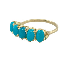 Load image into Gallery viewer, Bring vintage charm and vibrant colour to your collection with this pre-owned 9ct yellow gold band ring, featuring rich turquoise stones in a timeless setting—perfect for lovers of classic design with a bold twist.

Design: The ring features five oval-cut turquoise stones, each measuring approximately 6mm by 4mm, set in a row across the band for a striking yet elegant look. The vintage-style detailing adds texture and character to the overall design.

