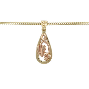 Bring symbolic elegance and rich heritage to your collection with this pre-owned 9ct Welsh yellow and rose gold Vine of Life teardrop pendant necklace, crafted from Cymru metal—perfect for celebrating life’s journey with timeless style.

Design: The pendant measures 2.6cm long including the bail and features a flowing Vine of Life motif within a polished teardrop frame, blending yellow and rose gold tones for a warm, nature-inspired look. It hangs from an 18" curb chain, completing the refined design.
