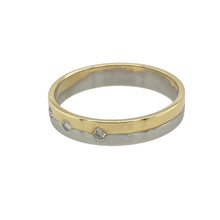 Load image into Gallery viewer, Bring modern contrast and subtle sparkle to your collection with this pre-owned 18ct yellow and white gold band ring, featuring a two-tone design and diamond accents—perfect for understated elegance with a contemporary edge.

Design: The band is set with three small brilliant-cut diamonds spaced across the top, offering a touch of sparkle. The ring features a yellow gold upper section and a white gold underside, creating a sleek, two-tone look.

