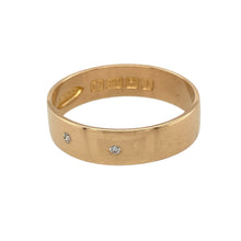 Load image into Gallery viewer, Bring rich tradition and refined sparkle to your collection with this pre-owned 22ct gold band ring, featuring three small diamonds in a timeless design—perfect for classic elegance with a luxurious finish.

Design: The band is 5mm wide and set with three small brilliant-cut diamonds spaced across the front, offering subtle sparkle in a clean and traditional layout.

