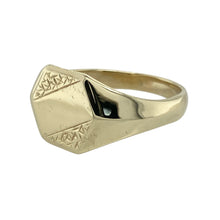 Load image into Gallery viewer, Add geometric style and classic detail to your collection with this pre-owned 9ct yellow gold six sided signet ring—perfect for a bold look with vintage character.

Design: The ring features an 11mm high six-sided front with patterned edging, offering a unique angular shape combined with refined detailing.
Material: Made from 9-carat yellow gold, the polished finish enhances the warm tone of the gold and draws attention to the textured border.

