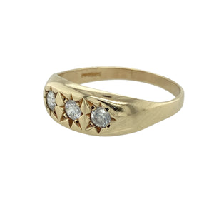 Add classic sparkle and symbolic style to your collection with this pre-owned 9ct yellow gold cubic zirconia set trilogy ring—perfect for timeless elegance with a meaningful touch.

Design: The ring features three approximately 3.5mm diameter cubic zirconia stones in a starburst setting across the 8mm high front, representing the past, present, and future in a balanced trilogy design.
