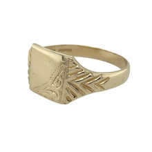 Load image into Gallery viewer, Add bold structure and classic detail to your collection with this pre-owned 9ct yellow gold patterned square signet ring—perfect for timeless style with a distinctive edge.

Design: The ring features an 11mm high square face with fine patterning, offering a strong geometric profile enhanced by vintage-inspired detailing.
Material: Made from 9-carat yellow gold, the polished finish brings out the warm tone of the metal and highlights the textured surface.

