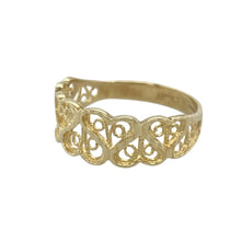 Load image into Gallery viewer, Add delicate charm and vintage-inspired detail to your collection with this pre-owned 9ct yellow gold filigree patterned heart band ring—perfect for romantic style with an elegant finish.

Design: The ring features a 7mm wide front with an intricate filigree pattern of openwork hearts, creating a light and graceful design full of sentiment.
Material: Made from 9-carat yellow gold, the polished finish enhances the fine detailing and adds a soft, warm glow.


