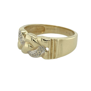 Add texture and contrast to your collection with this pre-owned 9ct yellow gold crossover weave band ring—perfect for bold design with a touch of two-tone elegance.

Design: The ring features a 9mm wide front with an intricate crossover weave pattern, accented by white gold detailing that adds depth and visual interest.
Material: Made from 9-carat yellow gold with white gold highlights, the polished finish enhances the interplay of tones and the dimensional weave.
