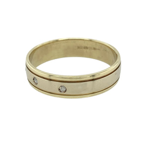 Add contemporary elegance and two-tone detail to your collection with this pre-owned 9ct yellow and white gold diamond set band ring—perfect for refined style with a subtle sparkle.

Design: The 6mm wide band features a central white gold panel set with sparkling diamonds, bordered by polished yellow gold edges for a sleek and modern contrast.
Material: Made from 9-carat yellow and white gold, the polished finish enhances the brilliance of the diamonds and the richness of the gold tones.
