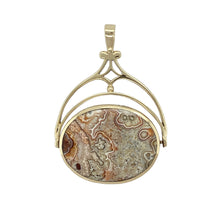 Load image into Gallery viewer, Add heritage charm and bold design to your collection with this pre-owned 9ct yellow gold double sided jasper and agate set fob pendant—perfect for statement style with historical appeal.

Design: The pendant features a rotating double-sided design, showcasing one side set with deep-toned jasper and the other with rich agate. Each oval gemstone measures 2.9cm by 2.2cm, framed in a traditional gold mount.
Material: Made from 9-carat yellow gold
