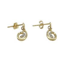 Load image into Gallery viewer, Add graceful movement and subtle sparkle to your collection with these 9ct gold and diamond swirl drop earrings—perfect for elegant style with a touch of brilliance.

Design: Each earring features a flowing swirl design accented with a sparkling diamond, creating a sense of movement and refined charm.
Material: Made from 9-carat gold, the polished finish enhances the curves of the design and the sparkle of the diamond detail.
