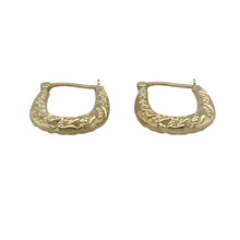 Load image into Gallery viewer, Add subtle texture and classic shine to your collection with these pre-owned 9ct yellow gold patterned oval creole earrings—perfect for lightweight elegance with timeless appeal.

Design: Each earring features a traditional oval creole shape with fine patterning that adds delicate detail and visual interest.
Material: Made from 9-carat yellow gold, the polished and textured finish enhances the intricate design with a warm, golden glow.

