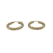 Load image into Gallery viewer, Add texture and elegant movement to your collection with these pre-owned 9ct yellow gold twisted hoop creole earrings—perfect for everyday style with a touch of flair.

Design: Each earring features a classic creole hoop shape with a twisted design, creating a dynamic look that catches the light beautifully.
Material: Made from 9-carat yellow gold, the polished finish highlights the curves and adds a warm, radiant glow.

