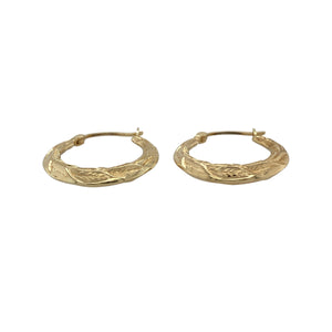 Add natural detail and graceful shine to your collection with these pre-owned 9ct yellow gold leaf patterned hoop creole earrings—perfect for elegant styling with a touch of nature-inspired charm.

Design: Each earring features a classic creole hoop shape adorned with an intricate leaf pattern, offering delicate texture and organic beauty.
Material: Made from 9-carat yellow gold, the polished and textured finish enhances the fine detailing with a soft, golden glow.
