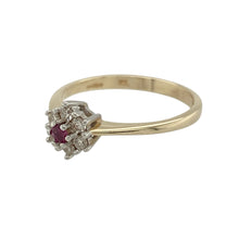 Load image into Gallery viewer, Bring vibrant charm and delicate sparkle to your jewellery collection with this pre-owned 9ct yellow gold diamond and ruby flower cluster ring—an elegant piece with vintage appeal and graceful femininity.

Design: A 2mm round ruby takes centre stage in this floral-inspired cluster, encircled by a halo of shimmering diamonds totalling approximately 0.10ct—creating a soft, romantic silhouette that catches the light beautifully.

