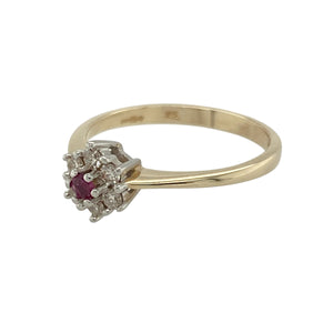 Bring vibrant charm and delicate sparkle to your jewellery collection with this pre-owned 9ct yellow gold diamond and ruby flower cluster ring—an elegant piece with vintage appeal and graceful femininity.

Design: A 2mm round ruby takes centre stage in this floral-inspired cluster, encircled by a halo of shimmering diamonds totalling approximately 0.10ct—creating a soft, romantic silhouette that catches the light beautifully.
