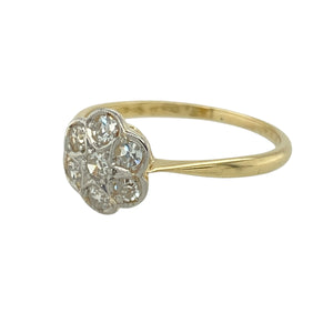 Bring vintage charm and radiant sparkle to your jewellery collection with this pre-owned 18ct yellow gold diamond flower cluster ring—an elegant piece with timeless appeal and delicate detailing.

Design: Featuring a vintage-style flower cluster with a 9mm high front, this ring is adorned with brilliant-cut diamonds that shimmer with every movement.
Material: Made from 18-carat yellow gold, the rich tone of the band enhances the brilliance of the diamonds and adds a warm, luxurious feel.
