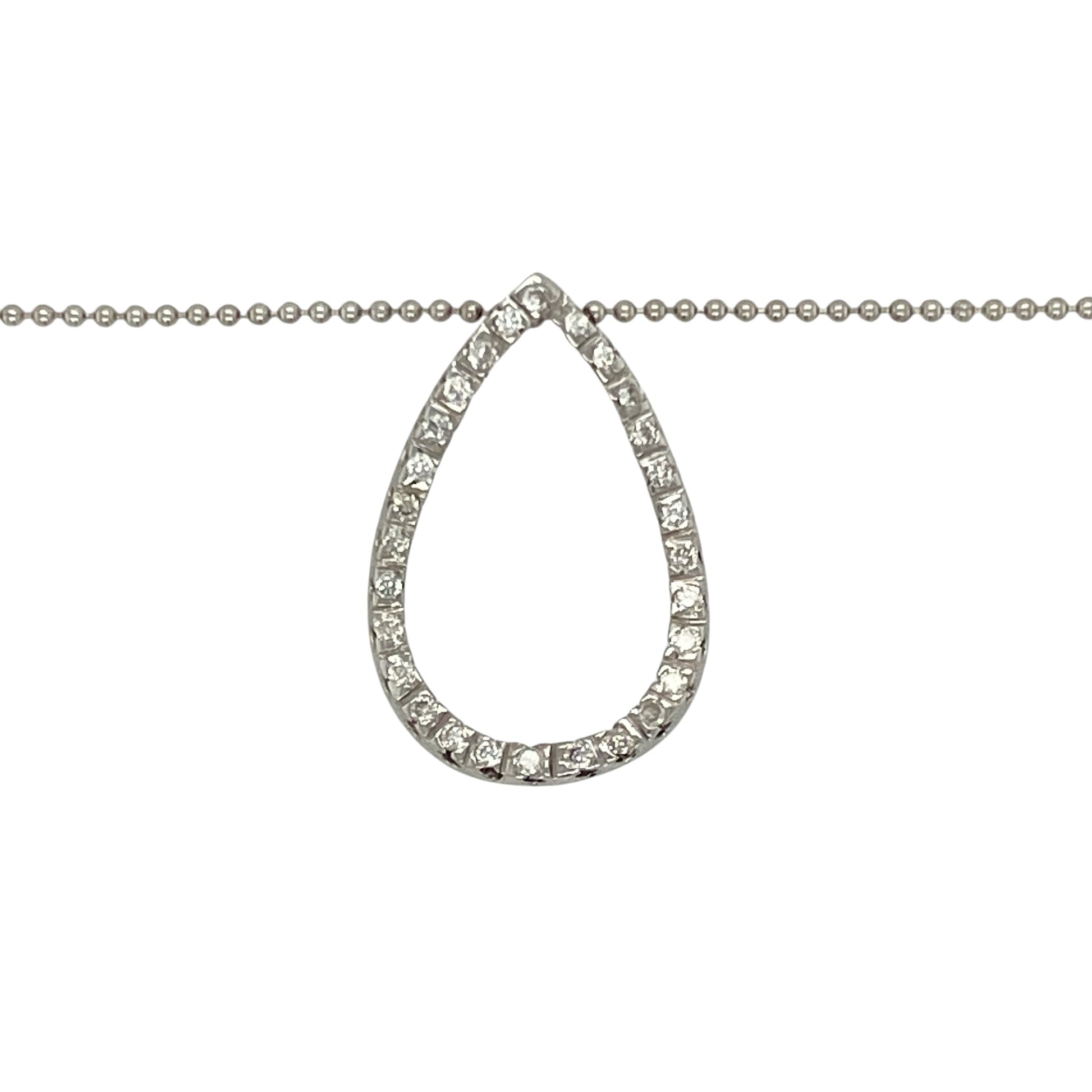 Bring graceful sparkle and modern elegance to your jewellery collection with this pre-owned 18ct white gold diamond open teardrop pendant on an 18" ball chain—a refined piece with flowing lines and timeless appeal.

Design: The 2.2cm long open teardrop pendant features diamond accents that add delicate brilliance to its elegant, curved shape.
Material: Made from 18-carat white gold, the pendant and polished ball chain offer a cool-toned finish that enhances the shimmer of the diamonds.
