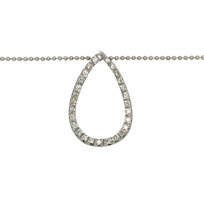 Bring graceful sparkle and modern elegance to your jewellery collection with this pre-owned 18ct white gold diamond open teardrop pendant on an 18" ball chain—a refined piece with flowing lines and timeless appeal.

Design: The 2.2cm long open teardrop pendant features diamond accents that add delicate brilliance to its elegant, curved shape.
Material: Made from 18-carat white gold, the pendant and polished ball chain offer a cool-toned finish that enhances the shimmer of the diamonds.
