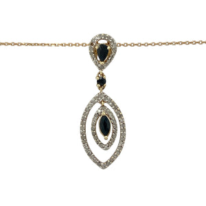 Bring rich colour and graceful movement to your jewellery collection with this pre-owned 9ct yellow gold diamond and sapphire double drop pendant on an 18" trace chain—a sophisticated piece with timeless beauty and elegant flow.

Design: The 3.8cm long double drop pendant features deep blue sapphires accented by shimmering diamonds, creating a refined contrast and fluid silhouette.
