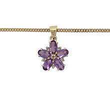 Load image into Gallery viewer, Bring vibrant colour and floral elegance to your jewellery collection with this pre-owned 9ct yellow gold diamond and amethyst flower pendant on an 18&quot; curb chain—a radiant piece full of charm and graceful detail.

Design: The 1.8cm long pendant, including the bail, features a flower motif with six marquise-cut amethysts measuring 5mm by 3mm, accented by a central diamond for added sparkle.

