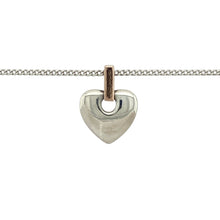 Load image into Gallery viewer, Bring heartfelt sentiment and Welsh heritage to your jewellery collection with this pre-owned Clogau heart pendant—crafted in 925 silver with 9ct Clogau rose gold on an adjustable curb chain for a meaningful and elegant finish.

Design: The 1.5cm long heart pendant, including the bail, features the Welsh word Cariad—meaning ‘love’—engraved on the bail, blending emotion with timeless design.

