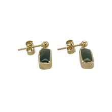 Load image into Gallery viewer, Bring vibrant colour and vintage-inspired elegance to your jewellery collection with these pre-owned 9ct yellow gold green stone rectangle drop earrings—a striking pair with bold lines and refined charm.

Design: Each earring features a rectangular green stone measuring approximately 11mm by 4mm, offering a sleek, elongated shape with eye-catching colour.
Material: Made from 9-carat yellow gold, the polished finish adds warmth and enhances the vivid tone of the green stones.

