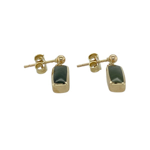 Bring vibrant colour and vintage-inspired elegance to your jewellery collection with these pre-owned 9ct yellow gold green stone rectangle drop earrings—a striking pair with bold lines and refined charm.

Design: Each earring features a rectangular green stone measuring approximately 11mm by 4mm, offering a sleek, elongated shape with eye-catching colour.
Material: Made from 9-carat yellow gold, the polished finish adds warmth and enhances the vivid tone of the green stones.
