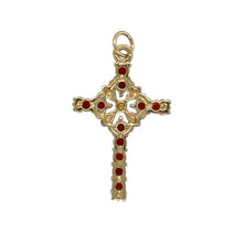 Load image into Gallery viewer, Bring rich colour and spiritual elegance to your jewellery collection with this pre-owned 9ct yellow gold garnet cross pendant—a timeless piece with warm tones and meaningful design.

Design: The cross pendant is adorned with garnet stones, each approximately 2.5mm in diameter, creating a vibrant and symmetrical design with deep red sparkle.
Material: Made from 9-carat yellow gold, the polished finish adds a soft glow that enhances the intensity of the garnet stones.

