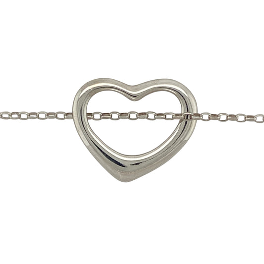 Bring modern simplicity and elegant sentiment to your jewellery collection with this pre-owned 9ct white gold open heart pendant on a 20" belcher chain—a timeless piece with soft curves and a contemporary finish.

Design: The pendant measures 18mm by 21mm and features an open heart shape with smooth lines, offering a clean and graceful silhouette.
Material: Made from 9-carat white gold, the polished finish gives a cool-toned shine that enhances the pendant’s modern appeal.
