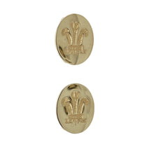 Load image into Gallery viewer, Bring heritage style and classic detail to your collection with these pre-owned 9ct yellow gold Welsh Three Feathers oval cufflinks—a distinguished pair with symbolic meaning and timeless design.

Design: Each cufflink features an oval face engraved with the iconic Welsh Three Feathers emblem, representing pride, tradition, and honour.
Material: Made from 9-carat yellow gold, the polished finish enhances the intricate detailing and offers a warm, refined appearance.

