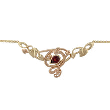 Load image into Gallery viewer, Bring rich colour and symbolic elegance to your jewellery collection with this pre-owned 9ct yellow and rose gold garnet Clogau Tree of Life necklace—a meaningful piece combining natural beauty with heritage design.

Design: The 16.5&quot; necklace features a detailed Tree of Life motif crafted in yellow and rose gold, highlighted by a 7mm by 5mm teardrop-shaped red garnet that adds depth and vibrant colour.

