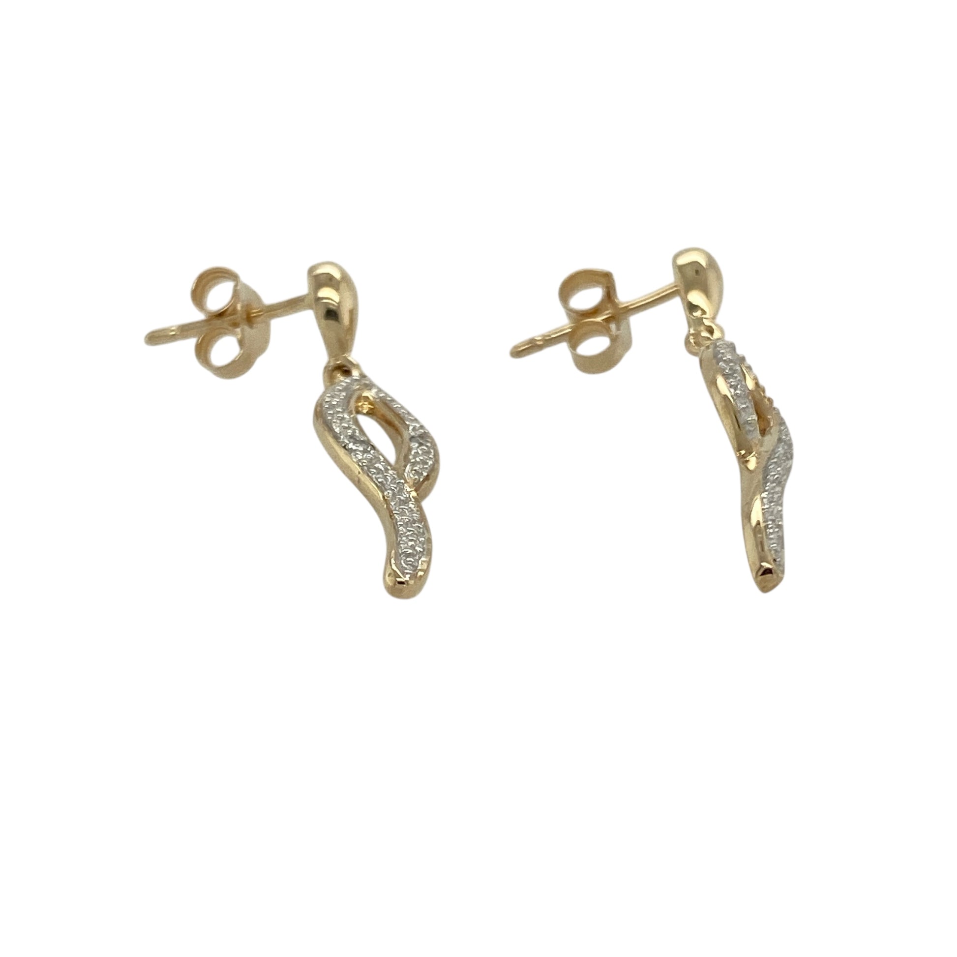 Bring graceful movement and classic sparkle to your jewellery collection with these pre-owned 9ct yellow gold diamond swirl drop earrings—a timeless pair with elegant curves and subtle brilliance.

Design: Each earring features a flowing swirl design adorned with sparkling diamonds, creating a refined and graceful silhouette.
Material: Made from 9-carat yellow gold, the polished finish adds warmth and enhances the delicate shimmer of the diamond accents.
