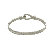Load image into Gallery viewer, Bring playful sparkle and classic charm to a young jewellery collection with this new solid 925 silver and cubic zirconia children&#39;s horseshoe bangle—a sweet and symbolic piece designed with timeless appeal.

Design: The 11mm high front features a horseshoe motif adorned with shimmering cubic zirconia stones, symbolising luck and adding a touch of sparkle.
Material: Made from solid 925 sterling silver, the polished finish offers a bright, smooth shine that enhances the brilliance of the stones.

