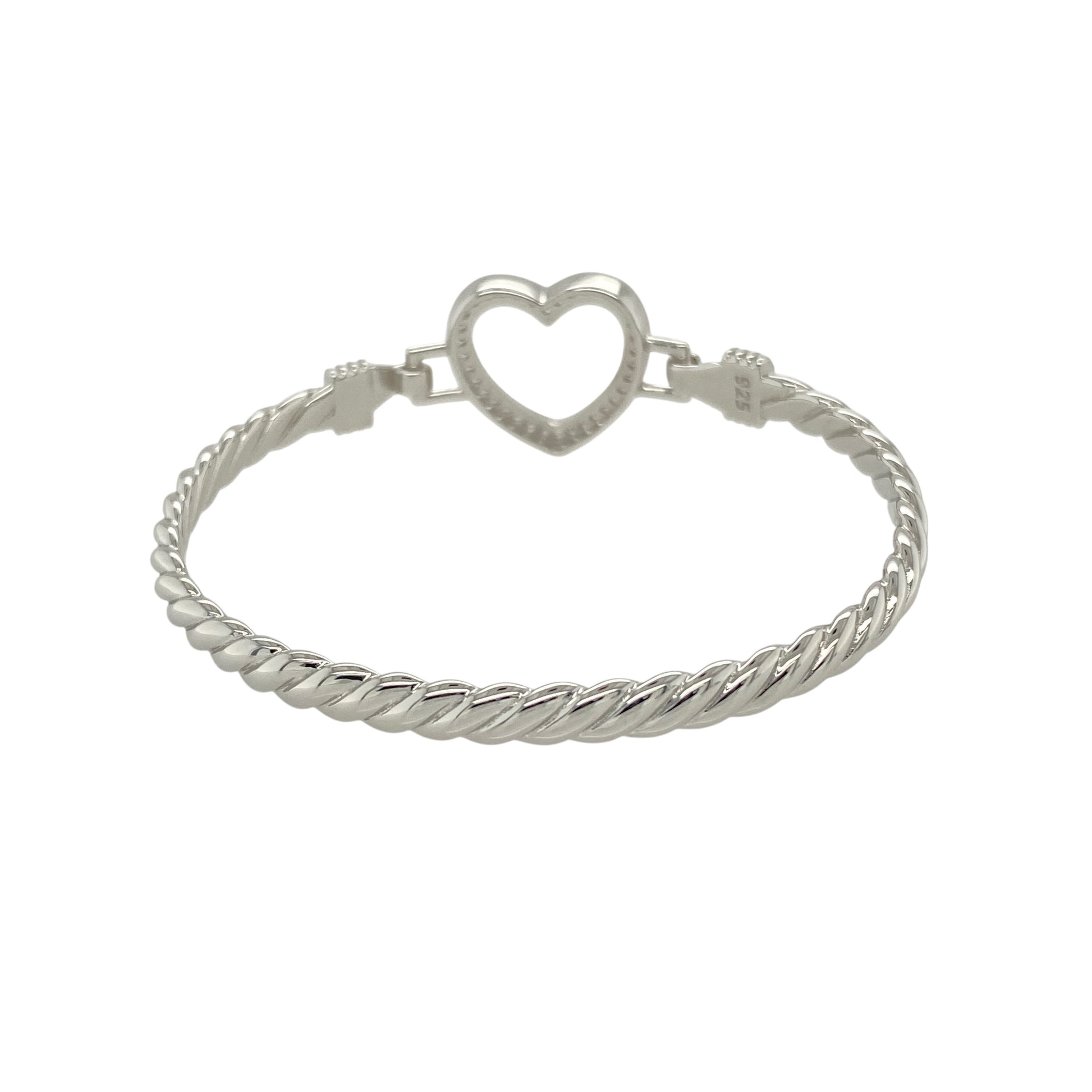 Bring sweet sentiment and delicate sparkle to a young jewellery collection with this new solid 925 silver and cubic zirconia children's open heart bangle—a graceful piece full of love and timeless charm.

Design: The 15mm high front features a beautifully shaped open heart, accented with sparkling cubic zirconia stones for a soft, elegant shine.
Material: Made from solid 925 sterling silver, the polished finish provides a bright, smooth surface that enhances the brilliance of the stones.
