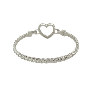 Bring sweet sentiment and delicate sparkle to a young jewellery collection with this new solid 925 silver and cubic zirconia children's open heart bangle—a graceful piece full of love and timeless charm.

Design: The 15mm high front features a beautifully shaped open heart, accented with sparkling cubic zirconia stones for a soft, elegant shine.
Material: Made from solid 925 sterling silver, the polished finish provides a bright, smooth surface that enhances the brilliance of the stones.
