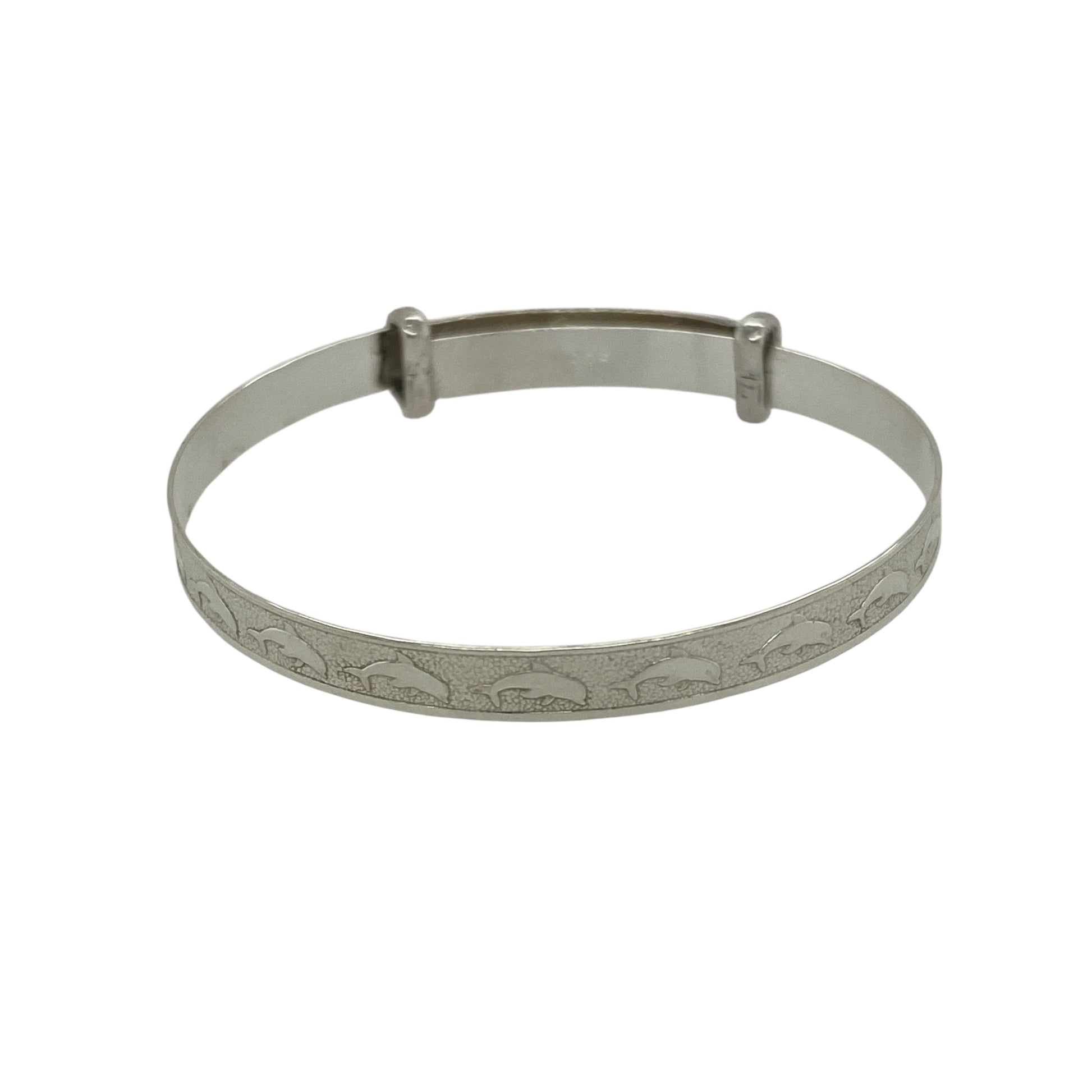 Bring playful charm and gentle elegance to a little one’s jewellery collection with this new 925 silver dolphin patterned baby expander bangle—a sweet and symbolic keepsake with a touch of ocean-inspired joy.

Design: The 4mm wide bangle features a delightful dolphin pattern etched along the band, symbolising playfulness, protection, and harmony.
Material: Made from solid 925 sterling silver, the polished finish adds a bright, smooth shine that highlights the detailed design.
