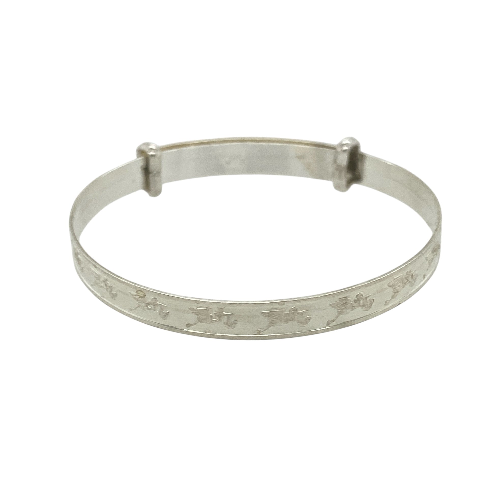 Bring sweet symbolism and classic charm to a little one’s jewellery collection with this new 925 silver stork carrying baby patterned baby expander bangle—a meaningful keepsake celebrating new life and precious beginnings.

Design: The 4mm wide bangle features a delicate pattern of a stork carrying a baby, a timeless symbol of birth and joyful arrival.
Material: Made from solid 925 sterling silver, the polished finish provides a smooth, radiant shine that beautifully highlights the detailed design.
