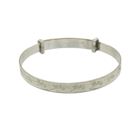 Bring sweet symbolism and classic charm to a little one’s jewellery collection with this new 925 silver stork carrying baby patterned baby expander bangle—a meaningful keepsake celebrating new life and precious beginnings.

Design: The 4mm wide bangle features a delicate pattern of a stork carrying a baby, a timeless symbol of birth and joyful arrival.
Material: Made from solid 925 sterling silver, the polished finish provides a smooth, radiant shine that beautifully highlights the detailed design.
