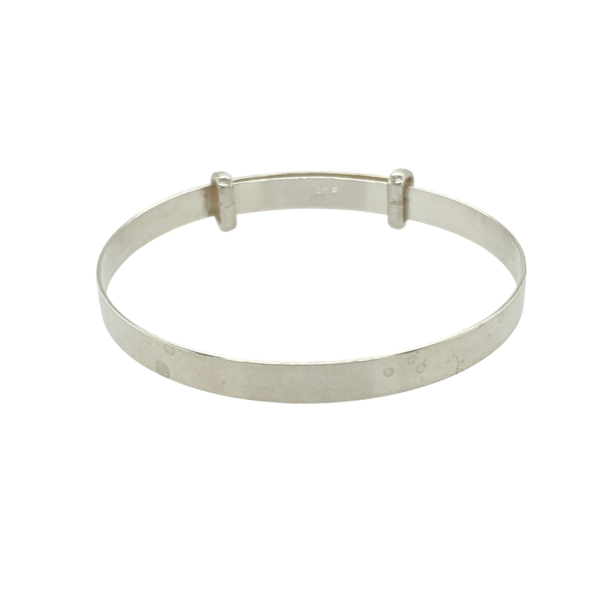 Bring timeless simplicity and lasting charm to a little one’s jewellery collection with this new 925 silver plain baby expander bangle—a classic keepsake with elegant design and everyday appeal.

Design: The 4mm wide bangle features a smooth, plain surface for a clean and timeless look, perfect for engraving or wearing as is.
Material: Made from solid 925 sterling silver, the polished finish gives a bright, reflective shine with a soft and gentle appearance.

