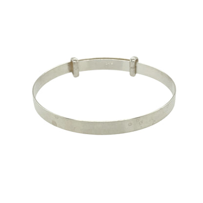 Bring timeless simplicity and lasting charm to a little one’s jewellery collection with this new 925 silver plain baby expander bangle—a classic keepsake with elegant design and everyday appeal.

Design: The 4mm wide bangle features a smooth, plain surface for a clean and timeless look, perfect for engraving or wearing as is.
Material: Made from solid 925 sterling silver, the polished finish gives a bright, reflective shine with a soft and gentle appearance.
