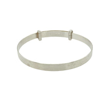 Load image into Gallery viewer, Bring timeless simplicity and lasting charm to a little one’s jewellery collection with this new 925 silver plain baby expander bangle—a classic keepsake with elegant design and everyday appeal.

Design: The 4mm wide bangle features a smooth, plain surface for a clean and timeless look, perfect for engraving or wearing as is.
Material: Made from solid 925 sterling silver, the polished finish gives a bright, reflective shine with a soft and gentle appearance.

