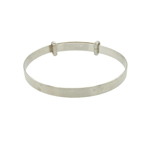 Bring timeless simplicity and lasting charm to a little one’s jewellery collection with this new 925 silver plain baby expander bangle—a classic keepsake with elegant design and everyday appeal.

Design: The 4mm wide bangle features a smooth, plain surface for a clean and timeless look, perfect for engraving or wearing as is.
Material: Made from solid 925 sterling silver, the polished finish gives a bright, reflective shine with a soft and gentle appearance.

