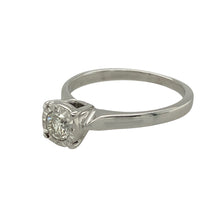 Load image into Gallery viewer, Bring refined sparkle and classic simplicity to your collection with this pre-owned 9ct white gold and diamond solitaire ring—elegant and timeless with a touch of brilliance.

Design: This ring features a brilliant-cut diamond of approximately 0.25ct, presented in an illusion setting that enhances the stone’s size and sparkle.
Material: Made from 9-carat white gold, the polished finish complements the bright clarity of the diamond for a clean, modern look.


